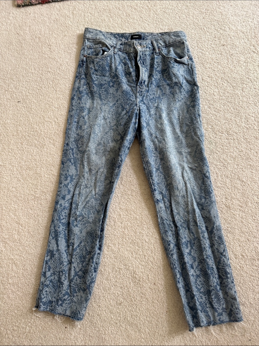 Express snake print raw hem jeans